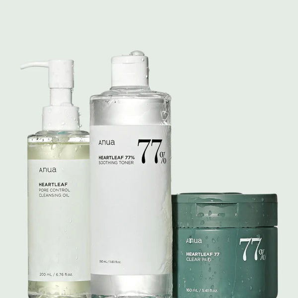 Anua Cleanser Heartleaf Pore Control Cleansing Oil hero with toner and clear pad